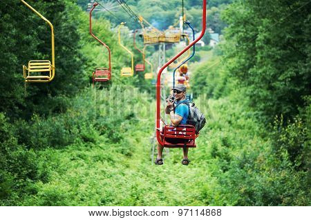 Tourist Going On Cable Car Funicular