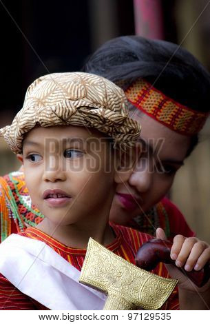 Young Indonesian Boy Playing With His Sister