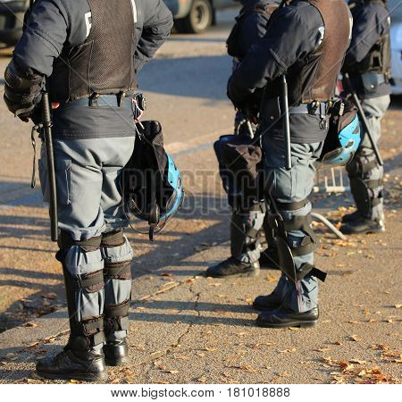 Riot Police With Helmets Before A Football Game