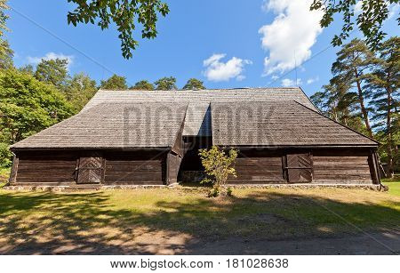 RIGA LATVIA - JUNE 13 2016: Harbour warehouse (circa 1697) of fishermen village of Kurzeme ethnic group. Exhibited in Ethnographic Open-Air Museum of Latvia since 1940