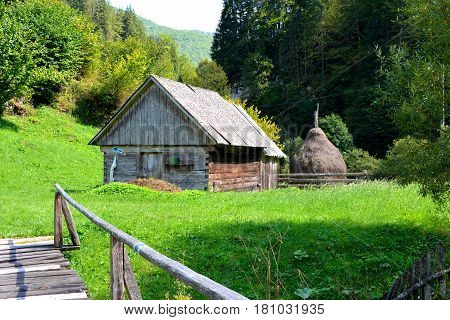 Landscape in Apuseni Mountains, Transylvania. The Apuseni Mountains is a mountain range in Transylvania, Romania, which belongs to the Western Romanian Carpathians, also called Occidentali in Romanian. The Apuseni Mountains have about 400 caves.
