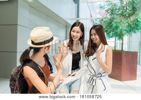Traveler saying goodbye to local people