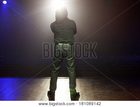 People On Stage In Motion, Out Of Focus