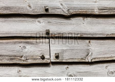 Textures patterns and backgrounds concept. Light old wooden wall detail board closeup