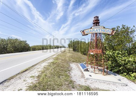Marathon Key Fl USA - March 16 2017: Welcome to Marathon Key sign on a lighthouse at the road side. Florida United States