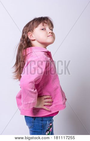 Little beautiful girl on a white background