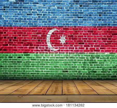 Azerbeijan flag painted on brick wall with wooden floor