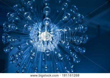 decorative designer chandelier on a dark background.