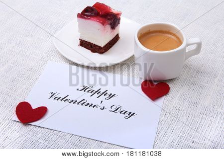 Slice of handmade cherry pie on a plate and classic espresso coffee in white background.