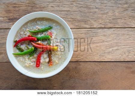 Soya bean dipping sauce with pork in coconut milk original Thai food.