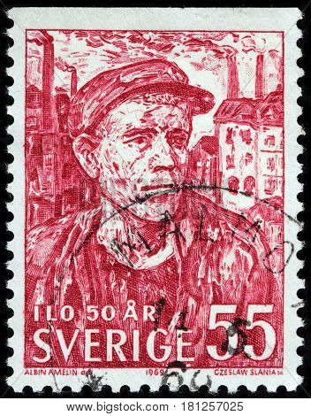 LUGA RUSSIA - FEBRUARY 7 2017: A stamp printed by SWEDEN shows image portrait of Worker - engraving after painting of famous Swedish artist Albin Amelin circa 1969.