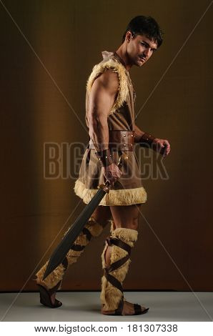 The obedient caveman awaits his lady for love.