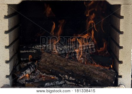 Wood Burning On A Fireplace With High Flames