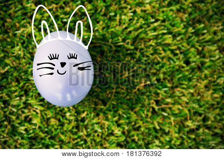 PE047_butterfly_02_bs_nf against violet easter egg on grass