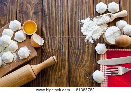 cooking delicious ravioli on a wooden background