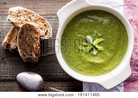 Spinach and Zucchini Cream Soup in a Bowl. Homemade Spinach Pottage Puree.
