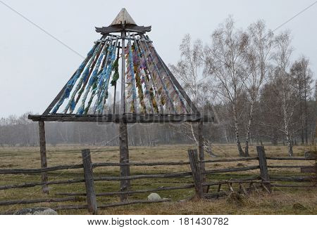 Buddhist construction with Zalaal tied tapes. Territory of temple-monastery in Arshan village. Tunkinsky district of Buryatia