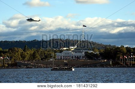 Canberra Australia - March 18 2017. Low flyover by the Snowy Hydro Southcare Rescue Helicopter at Regatta Point in the Commonwealth Park.