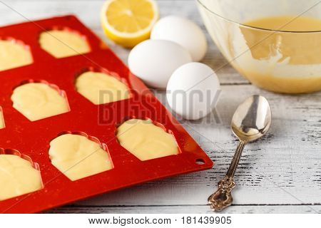 Pour Dough Into The Mold Foк Madelines Cookies