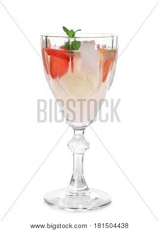 Glass of delicious wine spritzer on white background