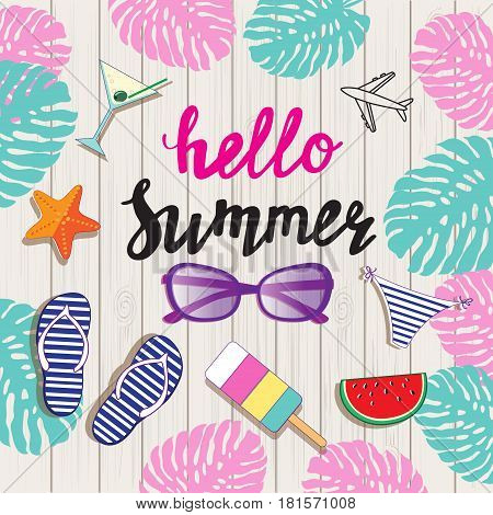 card hello summer calligraphy lettering with summer elements on the wooden background