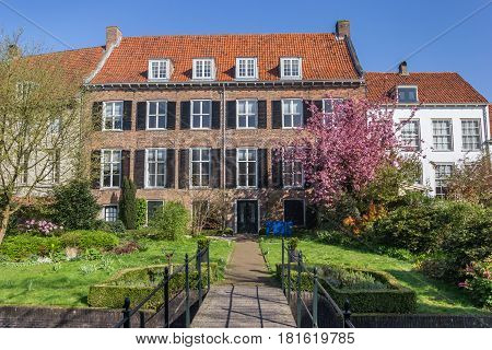 AMERSFOORT, NETHERLANDS - APRIL 09, 2017: House and garden in the historic center of Amersfoort, Netherlands