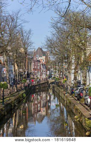 AMERSFOORT, NETHERLANDS - APRIL 09, 2017: Canal with shops in the center of Amersfoort, Holland