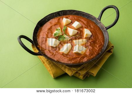 paneer butter masala or cheese cottage curry, popular indian lunch/dinner menu in weddings or parties, selective focus