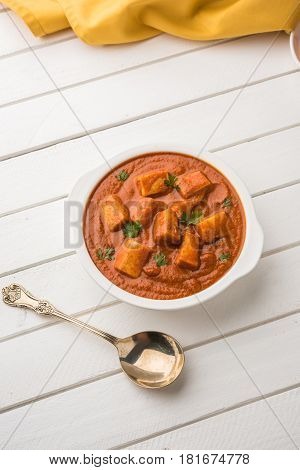 paneer butter masala or cheese cottage curry, popular indian lunch/dinner menu in weddings or parties, selective focus