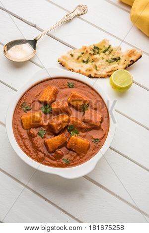 paneer butter masala or cheese cottage curry, popular indian lunch/dinner menu in weddings or parties, selective focus