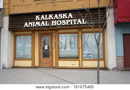 KALKASKA, MICHIGAN / UNITED STATES - NOVEMBER 27, 2016: One may seek veterinary car for one's pets at the Kalkaska Animal Hospital on Cedar Street in downtown Kalkaska.