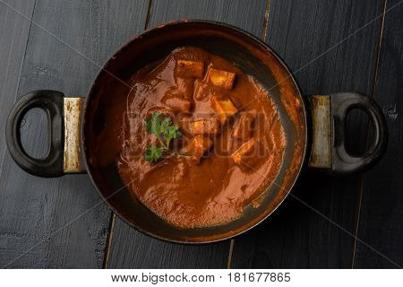 paneer butter masala or cheese cottage curry, popular indian lunch/dinner menu in weddings or parties, selective focus