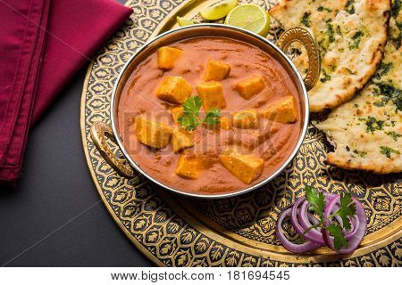 paneer butter masala or cheese cottage curry, popular indian lunch/dinner menu in weddings or parties, selective focus