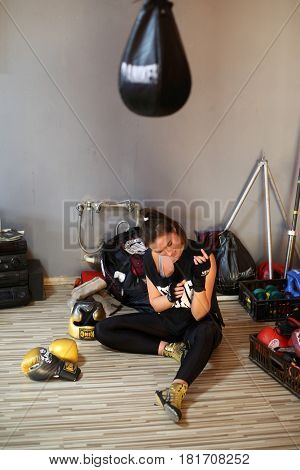 CRACOW POLAND - FEBRUARY 12 2016: Agnieszka Niestoj - talented Polish boxer durning boxing training with coach in the gym. Cracow Poland