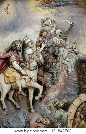 ZAGREB, CROATIA - MAY 28: The four horsemen of the apocalypse, Saint George altar in the Basilica of the Sacred Heart of Jesus in Zagreb, Croatia on May 28, 2015.