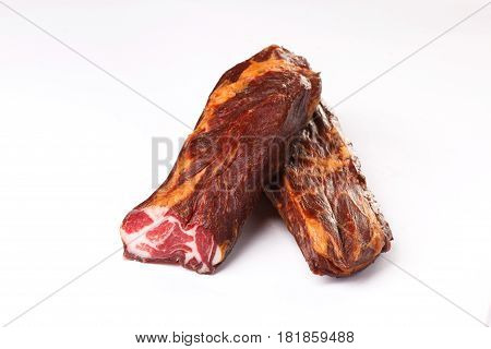 balyk on a white background. dried meat. beef, pork