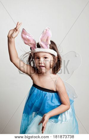 Asian Girl dresses up in bunny ears