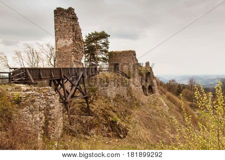 Zubstejn ruins of the castle built in the 13th century. It stands on a hill above the village Pivonice in Czech Republic. Overcast day