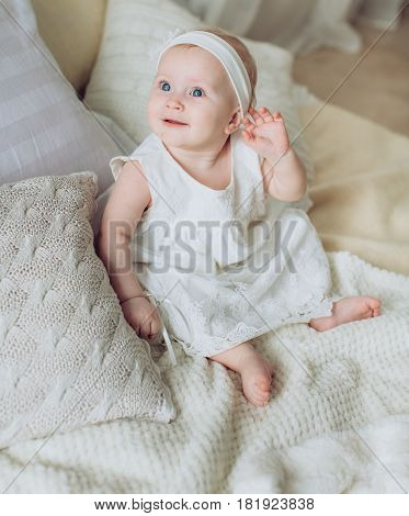 Young happy and beautiful mother with baby