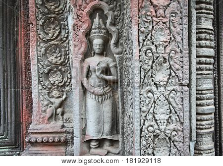Angel Apsara sculpture on the wall of Angkor Wat Angkor Thom Temple UNESCO world heritage Cambodia. Siem Reap Cambodia.