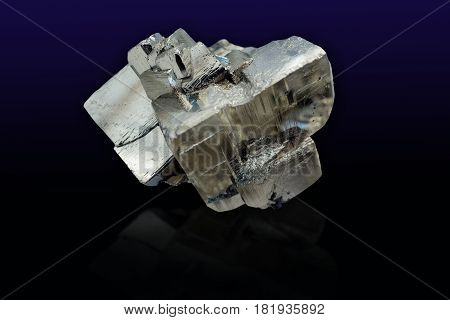 Pyrite mineral on black background close up.