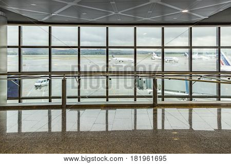 View From Modern New Departure Hall With Window To Apron