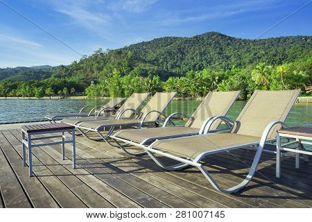 Beach Chair With Island Background, Koh Chang, Trad Province, Thailand.