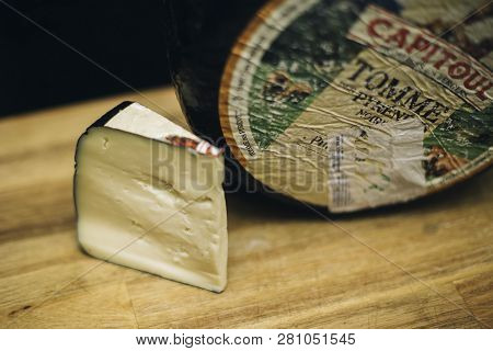 Belgrade, Serbia - November 22, 2018: Detail Of Tomme Des Pyrenees Cheese In Belgrade, Serbia. Tomme