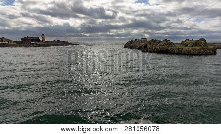 Portpatrick Harbor On An Overcast Day In Scotland, United Kingdom