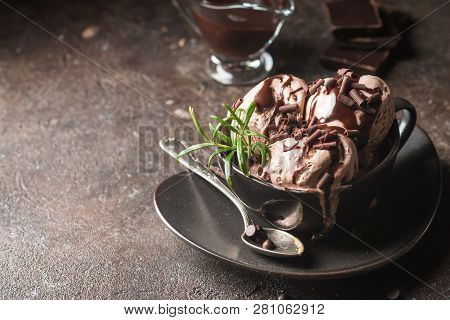 Chocolate Coffee Ice Cream Balls In A Bowl Over Dark Background