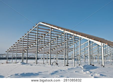 The Frame Of The Building Of Metal. Prefab Building Site. The Use Of A Metal Frame. Construction For