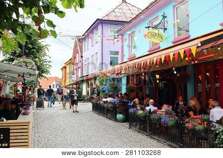 Stavanger, Norway - August, 8th Of 2018. View Of Colorful Street Of Holmegate, Which Experienced A R