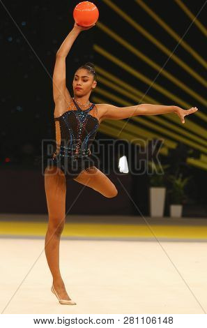 Kyiv, Ukraine - March 18, 2017: Rhythmic Gymnast Nastasya Generalova Of Usa Performs With Ball Durin