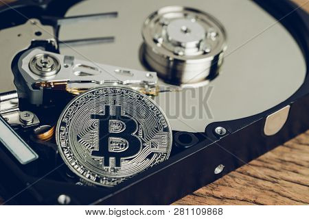 Bitcoin Crypto Currency Digital Money Concept, Shiny Metal Physical Bitcoin Coin With B Sign On Comp